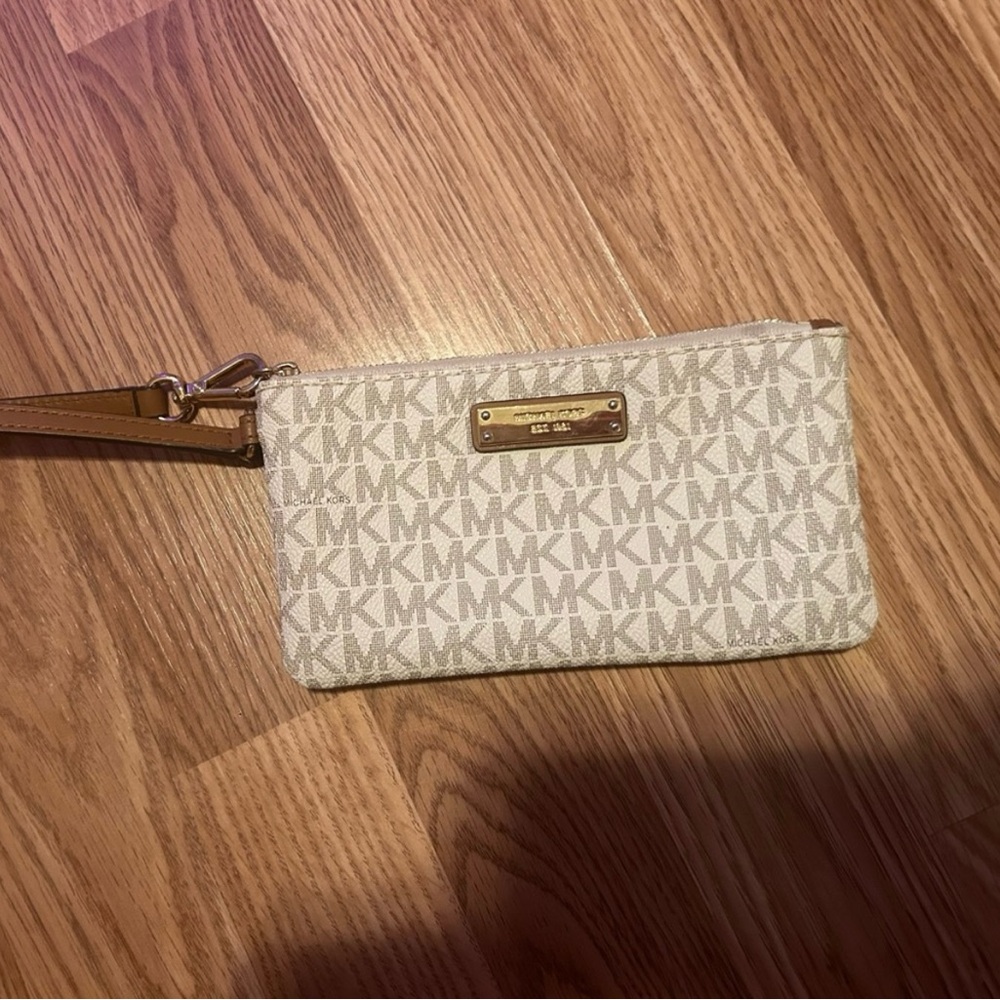 Michael Kors Wristlet with the MK symbol